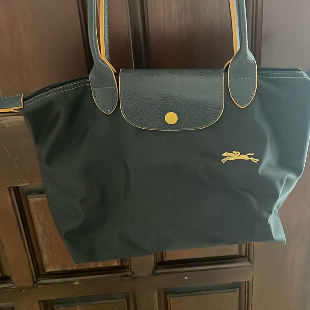 Grey with yellow trim hand bag.